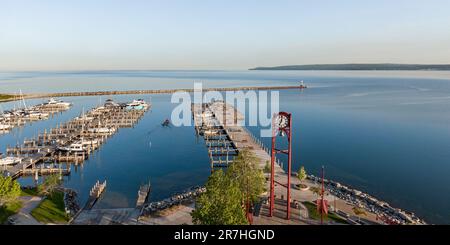 Aerial view of the Petoskey harbor in the morning with a fishing boat leaving Stock Photo