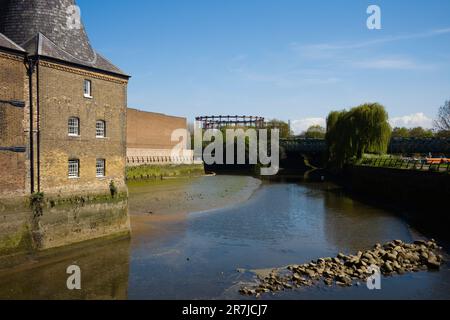 View towards gasometers from the Three Mills near Stratford, London on Bow Creek Stock Photo