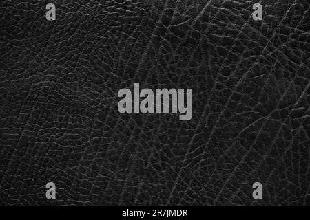 Natural texture of black leather. Dark abstract background Stock Photo