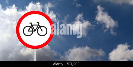 Red circle signboard, road sign on blue Sky. Stop halt allowed or do not enter. Bicycle or cyclist traffic, warning icon. Vector attention, forbidden Stock Photo