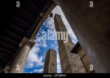 Wide-angle view of the Two Medieval Towers (Torre degli Asinelli and Torre Garisenda ) in Bologna, Italy, built in the 12th century. Stock Photo