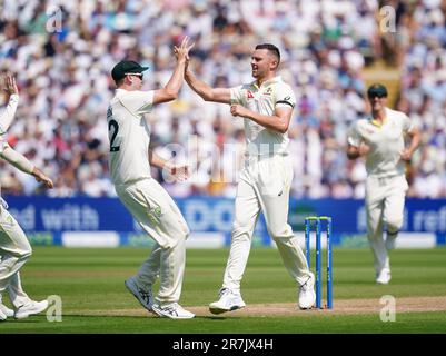 Australia's Josh Hazelwood (centre right) celebrates the wicket of England's Ben Duckett (not pictured) with team-mate Cameron Green on day one of the first Ashes test match at Edgbaston, Birmingham. Picture date: Friday June 16, 2023. Stock Photo