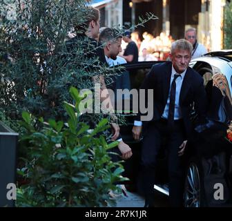 Sean Penn and his new girlfriend Olga Korotyayeva arrive at a party at Brasserie Astoria in Stockholm, Sweden, on June 14, 2023. Sean Penn is in Stock Stock Photo