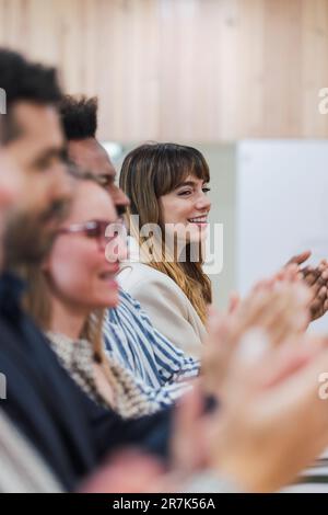 Business people clapping hands after a presentation in office Stock Photo