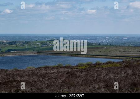 Landscape view from Ovenden Moor looking towards Thornton Moor Reservoir towards Thornton and in the distance, Bradford on 5th June 2023 in Ogden near Halifax, United Kingdom. Stock Photo