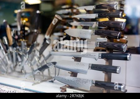 https://l450v.alamy.com/450v/2r7kbjk/kitchen-knives-with-blades-of-damascus-steel-for-sale-in-toledo-store-2r7kbjk.jpg