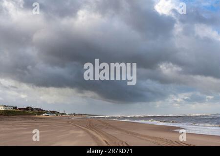 Dark sky over beach at Katwijk aan Zee in summer Stock Photo
