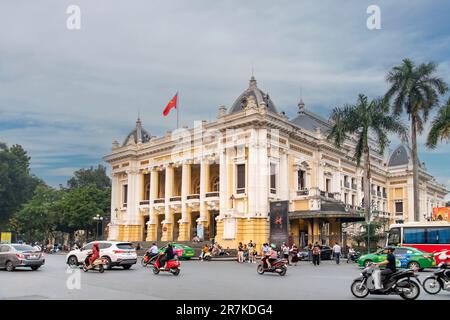 Hanoi, Vietnam-April 2023; View of Hanoi Opera House or Grand Opera House on Square of August Revolution busy with traffic Stock Photo