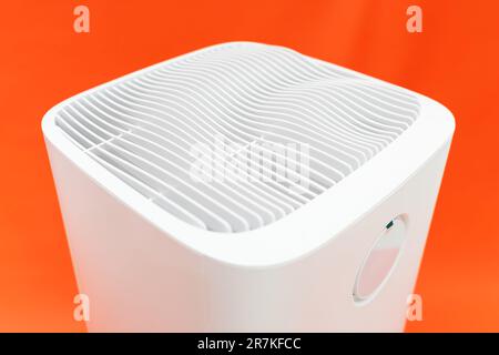 The White Air Purifier is an innovative and efficient solution for ensuring clean and fresh indoor air. Stock Photo