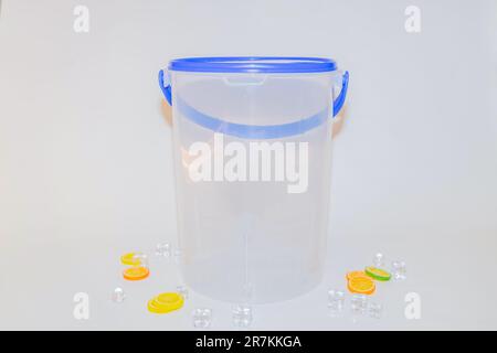 The Versatile Blue Plastic Cylinder Container with Lid is a practical and functional storage solution for your everyday needs Stock Photo