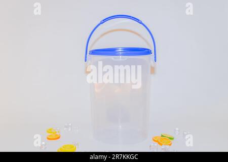 The Versatile Blue Plastic Cylinder Container with Lid is a practical and functional storage solution for your everyday needs Stock Photo