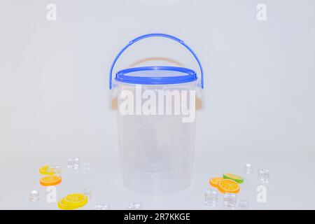 The Versatile Blue Plastic Cylinder Container with Lid is a practical and functional storage solution for your everyday needs Stock Photo