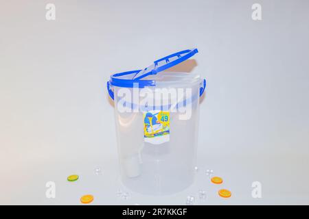The Versatile Blue Plastic Cylinder Container with Lid is a practical and functional storage solution for your everyday needs. Stock Photo