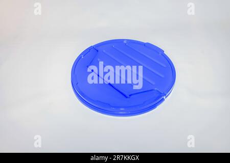 The Versatile Blue Plastic Cylinder Container with Lid is a practical and functional storage solution for your everyday needs. Stock Photo