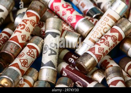 Heap of domestic electric plug fuses Stock Photo