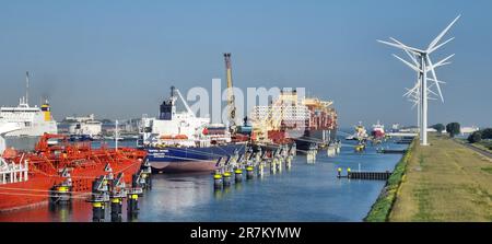 Panoramic picture from port Rotterdam with transport ships during daytime Stock Photo