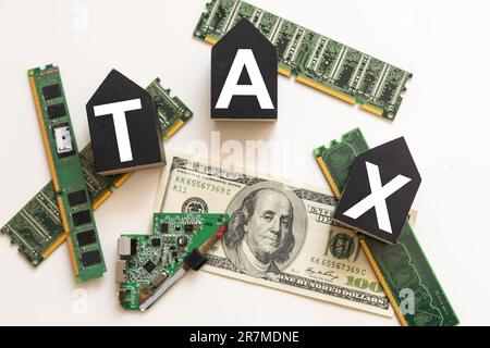 Tax or vat word on wooden cube on white board background. Business financial concept. Stock Photo