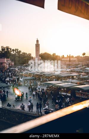 Jemaa el-Fnaa square: Marrakech's vibrant hub, alive with markets, performers, and cultural wonders, immersing visitors sensory experience Stock Photo