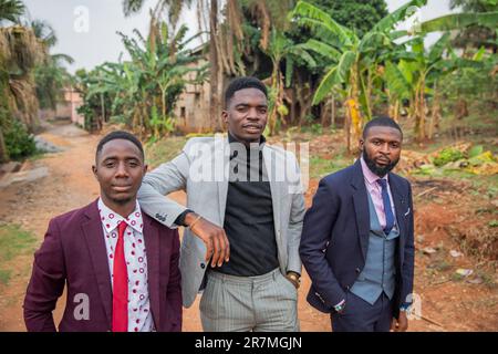 Three elegantly dressed American businessmen with confident gaze together Stock Photo