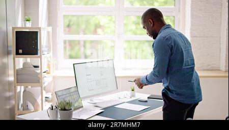 Taking Invoice Document Photo Using Phone Or Smartphone Stock Photo