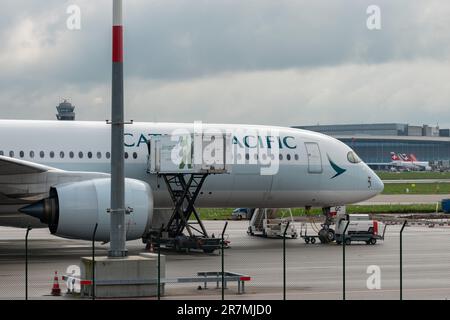 Zurich, Switzerland, May 2, 2023 B-LQC Cathay Pacific Airbus A350-941 aircraft is parking on the apron Stock Photo