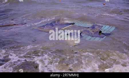 Part of wall of house floats near shore, floating debris has reached ...