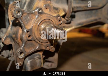 Wheel bearing and brake disc replacement and renovation. Auto service. Workshop. Stock Photo