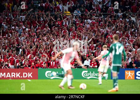 Denmark fans chant during the UEFA Euro 2024 Qualifying Group H match at Parken Stadium, Copenhagen. Picture date: Friday June 16, 2023. Stock Photo