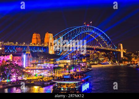 Sydney harbour bridge with bright illumination during Vivid Sydney 2023 public event in Australia. Stock Photo