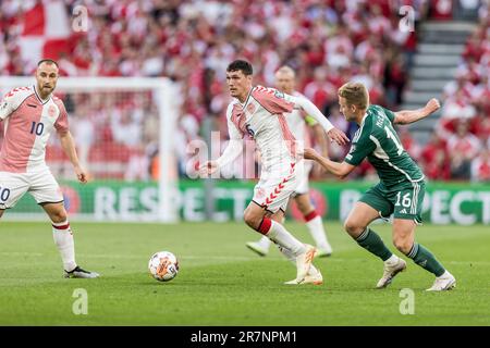 Copenhagen, Denmark. 16th June, 2023. Andreas Christensen (6) of Denmark and Ali McCann (16) of Northern Ireland seen during the UEFA Euro 2024 qualification match between Denmark and Northern Ireland at Parken in Copenhagen. (Photo Credit: Gonzales Photo/Alamy Live News Stock Photo