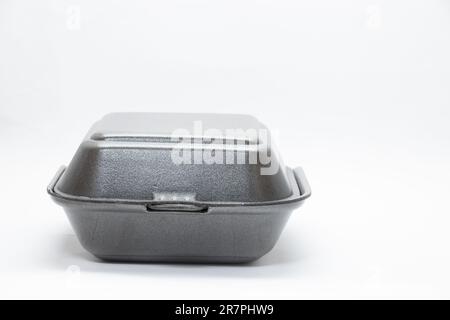 plastic food container with sushi from restaurant on isolated background, takeaway food order Stock Photo