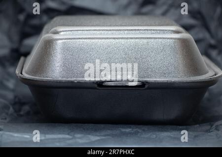 plastic packaging for sushi delivery from a restaurant on a table close-up Stock Photo