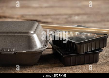 plastic packaging for sushi delivery from a restaurant on a table close-up Stock Photo