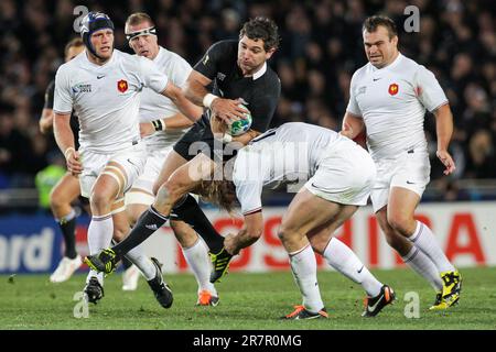 New Zealand’s Stephen Donald is tackled by Aurelien Rougerie of France in the Rugby World Cup final at Eden Park, Auckland, New Zealand, Sunday, October 23, 2011. Stock Photo