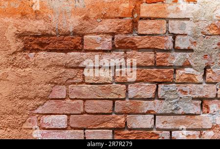 Old weathered brick wall. Antique red brick wall Stock Photo