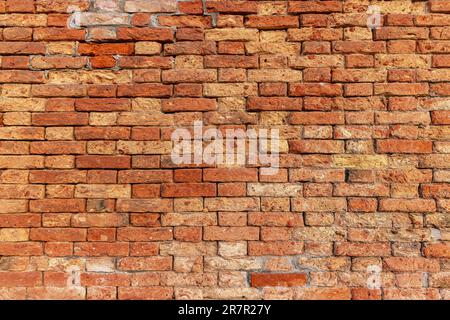 Red brick wall. Texture of old brown and red brick wall backgorund. Stock Photo