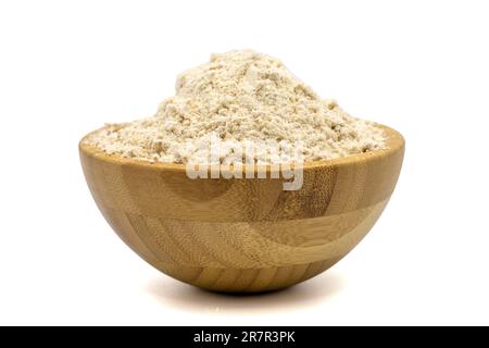 Mahlep powder isolated on white background. Mahlep powder in wooden bowl Stock Photo