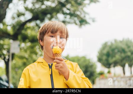 Boy Wearing Yellow Rain Coat Smiling while Fishing Stock Photo - Image of  lake, rest: 156648746