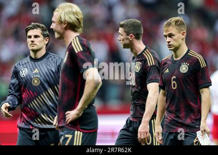 Warschau, Poland. 16th June, 2023. Germany national team players Jonas Hofmann, Julian Brandt, Robin Gosens and Joshua Kimmich show their disappointment in Warsaw after losing 1-0 to Poland. Credit: Christian Charisius/dpa/Alamy Live News Stock Photo