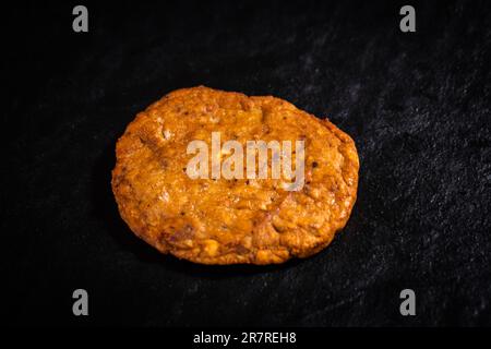 Hamburger Steak isolated on black Stock Photo