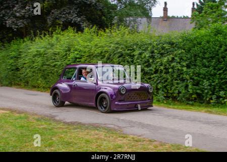 1981 80s eighties Austin Morris Mini City Purple Petrol 998 cc; a range of rare, exciting and unusual vehicle enthusiasts & attendees at Worden Park Motor Village showcase, Leyland Festival, UK Stock Photo