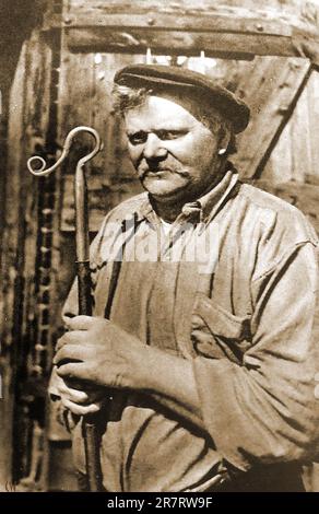 A 1933 portrait of one of the Mitchell brothers, Blacksmith and shepherds crook maker of Pycombe, Sussex , England. Stock Photo