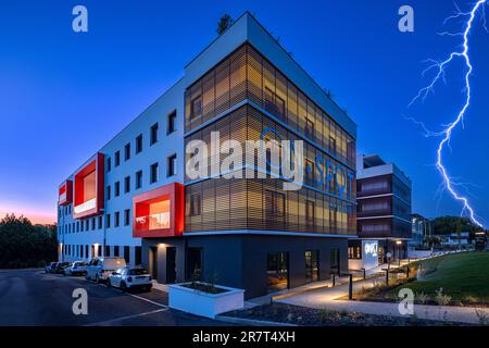 Night view of the ON SPOT Bayonne construction, office building with shared services (coworking spaces) in the Basque Country (Bayonne, France). Stock Photo