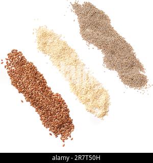 Set of different grains from chia, flax, white sesame seeds isolated on white background. Flat lay. View from above. Superp foods, concept of healthy Stock Photo