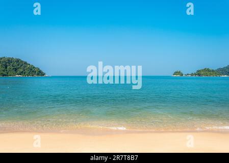 Pangkor island with the beach of the tourist village Teluk Nipah and the small isles of Mentangor and Giam in the Malaysian state of Perak at the Stock Photo