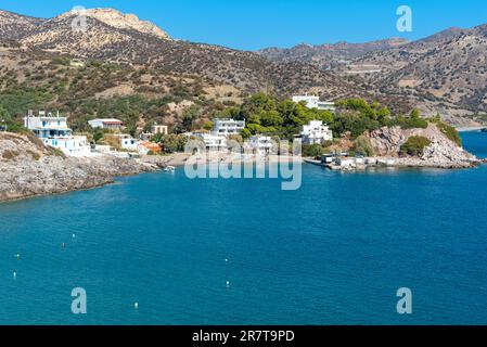 Little beach at the promenade of the tourist resort Kali Limenes at the south coast of Crete. It is also known as a major bunkering spot for ships in Stock Photo