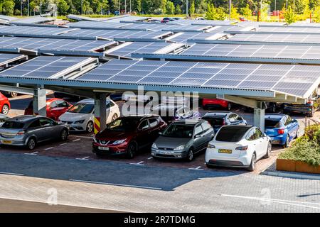 LEEDS, UK - MAY 25, 2023.  A self sufficient parking lot with park and ride facilities and solar panels for electric car charging in an innovative tec Stock Photo