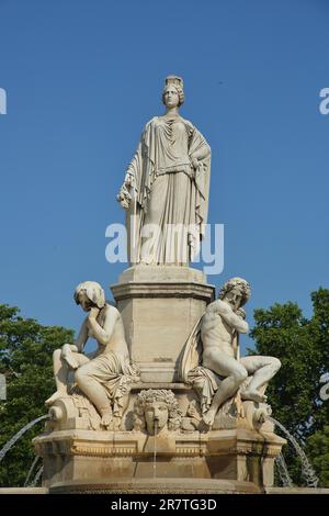 Fontaine Pradier with figure, ornamental fountain, sculpture, figures, queen, crown, white, shield, allegory, city, Esplanade Charles-de-Gaulle Stock Photo