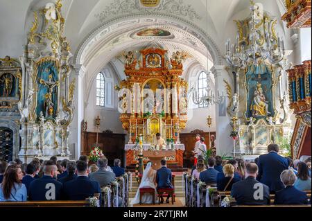 Wedding in the parish church of St.Theodor and Alexander in Haldenwang, Allgaeu, Bavaria, Germany Stock Photo