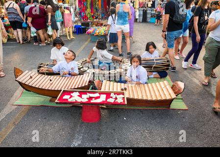 Traditional music on the street of the weekly Krabi walking street night market Stock Photo